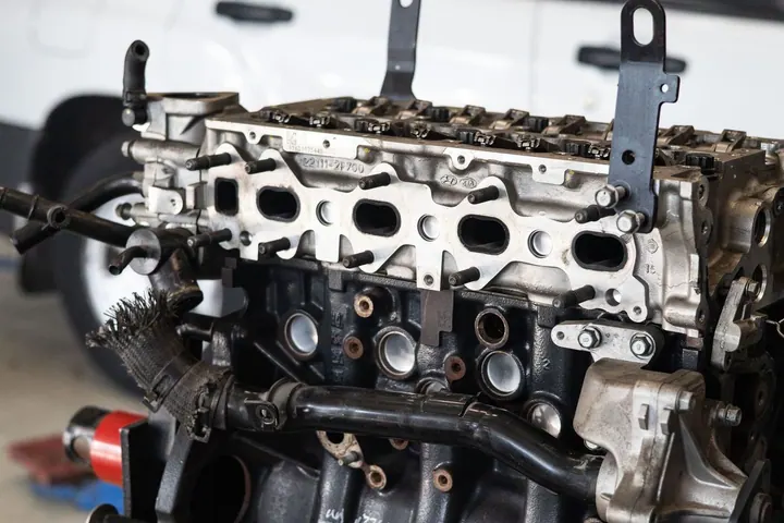 Automotive engine assembly in a workshop