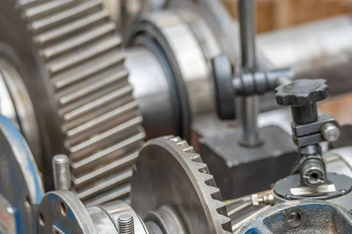 Metal gears and mechanical parts in a workshop